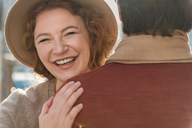 Woman with Natural Smile at Trusted Dental Excellence